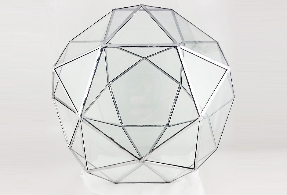 bright solder joints on the icosidodecahedron geometric glass succulent terrarium