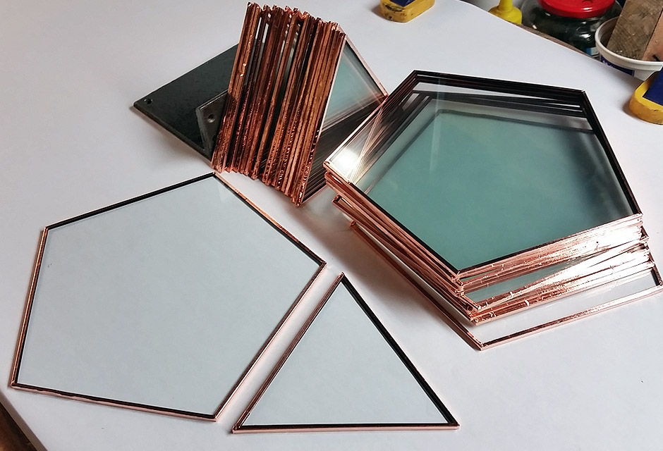 Glass pentagon and triangles wrapped with copper foil