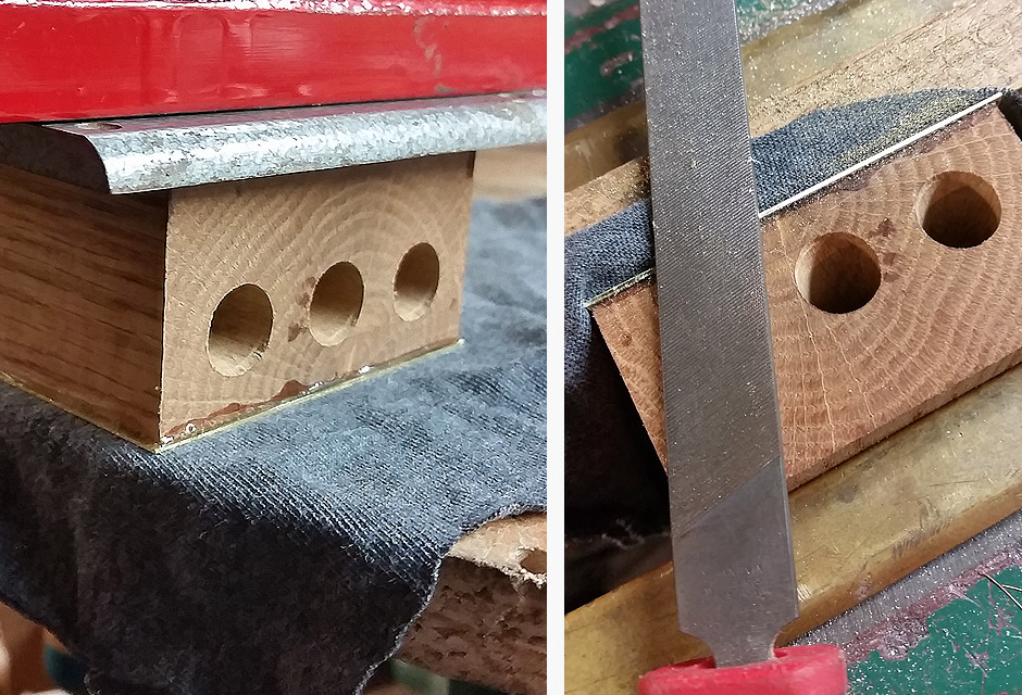 trimming excess brass edges to width of wood block with smoothing file